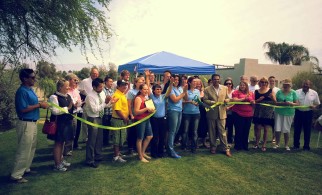 Pearl Verre, second from right, celebrates with GRID Alternatives and community partners at the Desert Rose solar ribbon cutting.